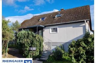 Haus kaufen in 65385 Rüdesheim am Rhein, ** Rüdesheim-Presberg: Zweiparteienhaus mit Einliegerwohnung in ruhiger Lage **