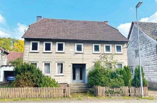 Einfamilienhaus kaufen in Merxhausener Straße 27, 37627 Heinade, Einfamilienhaus mit Nebengebäuden - vermietet