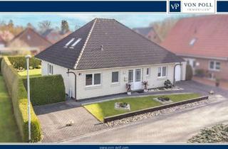 Haus kaufen in 26802 Moormerland, Bungalow mit ELW: Exklusives Wohnen am Pool