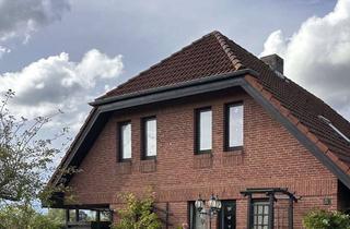 Haus kaufen in Paul-Herberger-Straße, 25709 Marne, Renoviertes Architektenhaus, Feldrandlage, Kamin, Garage