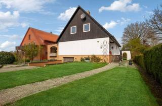 Einfamilienhaus kaufen in 31712 Niedernwöhren, Charmantes Einfamilienhaus mit Einliegerwohnung in Niedernwöhren