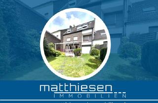 Haus kaufen in 47839 Hüls, Vielseitiges Reihenmittelhaus mit Einliegerwohnung und Garage in zentraler Lage in Krefeld-Hüls