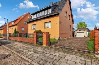 Einfamilienhaus kaufen in 30916 Isernhagen, 3 Wohneinheiten! Einfamilienhaus mit großem Anbau nach WEG aufgeteilt in Isernhagen - Altwarmbüchen