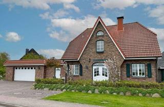 Einfamilienhaus kaufen in 25761 Westerdeichstrich, Stinteck: Traumhaftes Einfamilienhaus mit großer Terrasse und schickem Kamin in Deichnähe