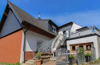 Haus kaufen in 41517 Grevenbroich, Grevenbroich - Charmante 3-Zimmer-Wohnung mit Kamin und Terrasse in naturnaher Lage in Grevenbroich-Neuenhausen