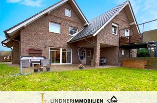 Haus kaufen in 49843 Uelsen, Einladendes Wohnen mit Einliegerwohnung und Gartenparadies!