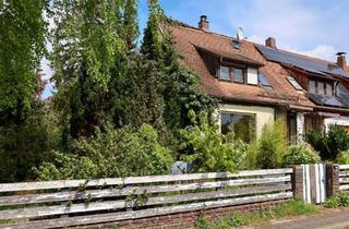 Haus kaufen in 90411 Nürnberg, Nürnberg - Charmantes Reihenendhaus mit großem Garten - Sanierungsbedürftig