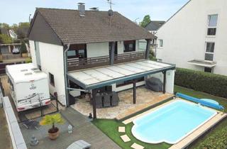 Einfamilienhaus kaufen in 40764 Langenfeld, Langenfeld - Freistehendes Einfamilienhaus mit Pool für Ihre Familie