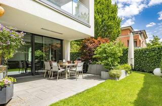 Wohnung kaufen in 81927 Bogenhausen, Familienfreundliche Gartenwohnung in direkter Parklage