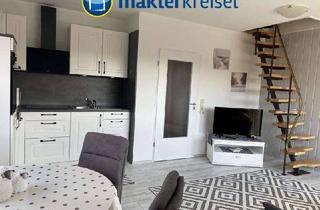 Wohnung kaufen in 26553 Dornum, Helle Eigentumswohnung in ruhiger Lage von Neßmersiel