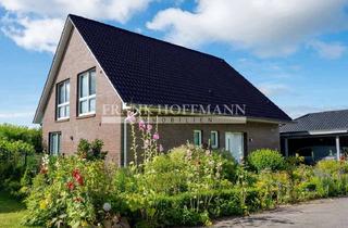 Einfamilienhaus kaufen in 24632 Heidmoor, Hochwertig, modern, energieeffizient! Einfamilienhaus in Feldrandlage in Heidmoor