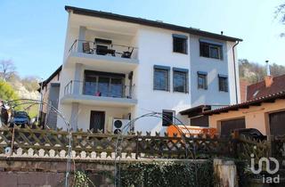 Einfamilienhaus kaufen in 63875 Mespelbrunn, Haus mit Anbau-Gewerbe-/Wohnmöglichkeit und 3 Garagen