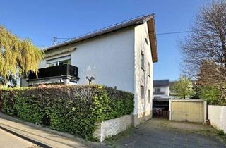 Haus kaufen in 53359 Rheinbach, Zweifamilienhaus mit Garten in Rheinbach