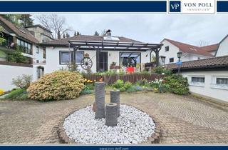 Einfamilienhaus kaufen in 61276 Weilrod, Gemütliches Einfamilienhaus mit Kamin, liebevoll angelegtem Garten, Fernblick und zwei Garagen