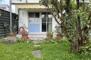 Wohnung kaufen in 82110 Germering, Helle Erdgeschoss-Wohnung mit liebevoll angelegtem Garten in Unterpfaffenhofen