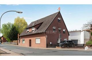 Wohnung kaufen in 38554 Weyhausen, Gemütliche Erdgeschosswohnung mit überdachter Terrasse und Gartenidylle in Weyhausen