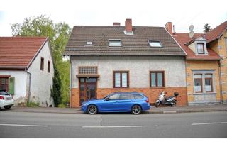 Haus kaufen in 66133 Saarbrücken, Charmantes Zweifamilienhaus mit Garten: Ihr perfektes Zuhause!