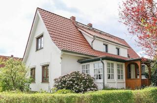 Einfamilienhaus kaufen in 28857 Syke, Syke - Charmantes Wohnhaus auf idyllischem Grundstück in zentraler Lage von Syke!