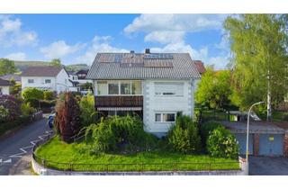Haus kaufen in 61250 Usingen, Wohnvielfalt in Usingen: Zweifamilienhaus mit 140 m2 Wohnraum auf 767 m2 Grundstück