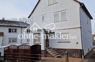 Haus kaufen in 34599 Hessen - Neuental, Wohnhaus in gepflegtem Zustand in Neuental, 3 Garagen, landwirtschaftl.Gebäude, Garten 1523 qm