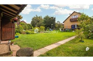 Doppelhaushälfte kaufen in 23867 Sülfeld, Charmante Doppelhaushälfte mit 4 Zimmern, Garage und Garten in Sülfeld