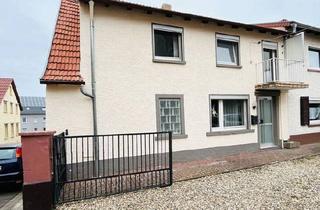 Doppelhaushälfte kaufen in 67310 Hettenleidelheim, Hettenleidelheim - Attraktives Renditeobjekt: Doppelhaushälfte in ruhiger Wohnlage