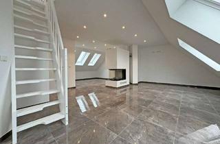Wohnung kaufen in 60388 Bergen-Enkheim, Sanierte Dachgeschosswohnung mit Skylineblick!