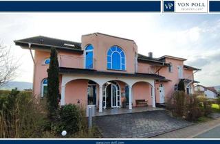 Einfamilienhaus kaufen in 37287 Wehretal, Stilvolles Einfamilienhaus mit zwei Einliegerwohnungen in ruhiger Lage