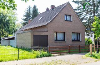 Haus kaufen in 49610 Quakenbrück, Gemütliches Wohnhaus mit Garage und großem Garten