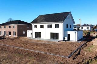 Doppelhaushälfte kaufen in 31626 Haßbergen, Haßbergen - Neue gerade fertige Doppelhaushälfte zum Verkauf