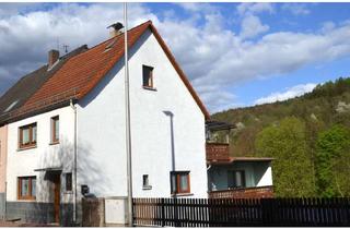 Einfamilienhaus kaufen in 63872 Heimbuchenthal, Einfamilienhaus mit. 2 Garagen und Garten