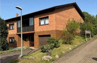 Einfamilienhaus kaufen in 66679 Losheim, Losheim am See - Gepflegtes Einfamilienhaus als Renditeobjekt, mit vermieteter ELW