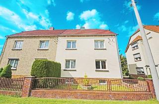 Doppelhaushälfte kaufen in 06779 Raguhn-Jeßnitz, Raguhn-Jeßnitz - gepflegte Doppelhaushälfte auf parkähnlichem Grundstück in Raguhn - auch für Wohnen mit Gewerbe geeignet