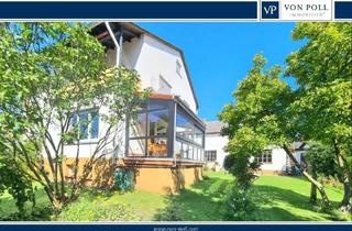Haus kaufen in 35647 Waldsolms, Waldsolms - Traum im Grünen mit viel Platz, tollem Blick, Wintergarten, Balkon, Garage und schönem Garten