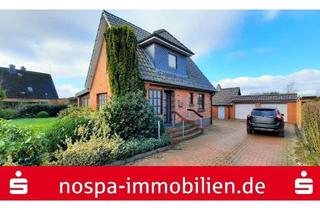 Haus kaufen in 24594 Remmels, Teilunterkellertes Wohnhaus mit Doppelgarage, Carport und Gartenhaus