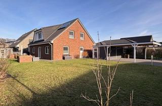 Einfamilienhaus kaufen in 24576 Bad Bramstedt, NEUER PREIS für ein junges, modernes Einfamilienhaus mit 6 Zimmern, Carport und Garten
