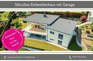 Haus kaufen in 97422 Schweinfurt, Provisionsfrei: Stilvoller Bungalow mit traumhaftem Ausblick an der Haardt provisionsfrei