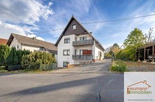 Anlageobjekt in 56593 Horhausen, Voll vermietetes Anlageobjekt mit 3 großen Wohnungen und 4 Garagen