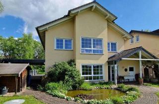 Einfamilienhaus kaufen in 65604 Elz, Elegantes Einfamilienhaus mit Blick in die Natur mit Aufzug in Bestlage von Elz - Nähe Limburg