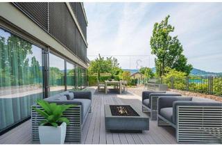 Wohnung kaufen in 76530 Innenstadt, MODERNE GARTEN-MAISONETTEWOHNUNG MIT TIEFGARAGENSTELLPLÄTZEN