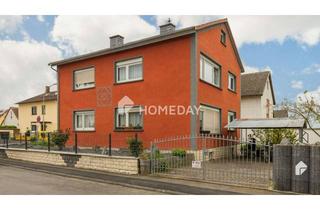 Haus kaufen in 61194 Niddatal, Attraktives MFH mit Garten und 3 Stellplätzen in ruhiger Wohngegend