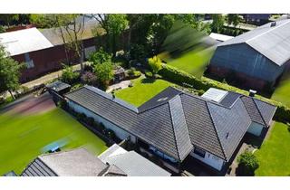 Haus kaufen in 25795 Weddingstedt, Großzügiger Winkelbungalow in ruhiger Wohnlage mit Ausbaureserve und gepflegtem Garten