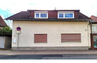 Haus kaufen in 61209 Echzell, Wohn- und Geschäftshaus mit einer Wohnung, Büroetage und Garage!