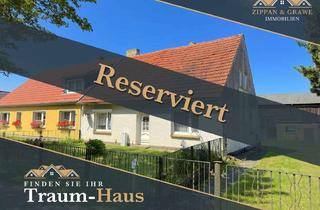 Doppelhaushälfte kaufen in 18314 Lüdershagen, Reserviert – Handwerkertraum: Charmante Doppelhaushälfte mit großem Grundstück und Scheune!