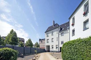 Anlageobjekt in 03172 Guben, Mehrfamilienhaus mit Garagen im Stadtkern der Stadt Guben