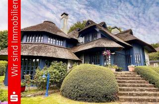 Haus kaufen in 49186 Bad Iburg, Exklusives Wohnjuwel mit Reetdach!
