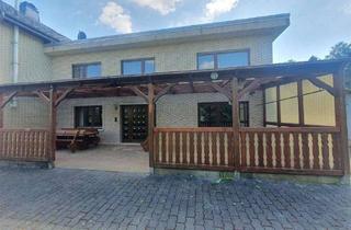 Einfamilienhaus kaufen in 56316 Raubach, Einfamilienhaus mit ausgebautem Nebengebäude und großem Grundstück