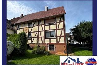 Einfamilienhaus kaufen in 36325 Feldatal, Einfamilienhaus mit schönem Grundstück und Kaminofen