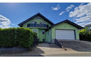 Einfamilienhaus kaufen in 35794 Mengerskirchen, Neuwertiges Einfamilienhaus mit Einliegerwohnung in modernem Wohngebiet.