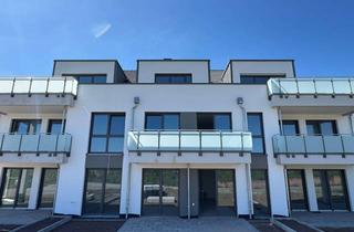Wohnung kaufen in 65474 Bischofsheim, Neubauwohnung in idyllischer Feldrandlage